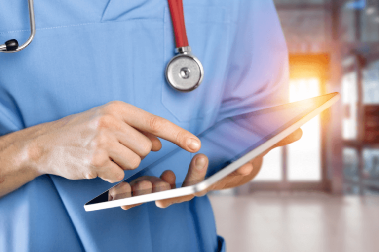 Close-up of doctor at hospital working with tablet © BillionPhotos.com/stock.adobe.com